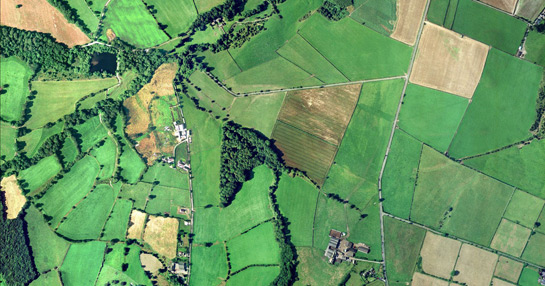 Aerial photograph of Gunthwaite, Barnsley, showing piecemeal enclosure to the left and surveyed enclosure to the right of the picture