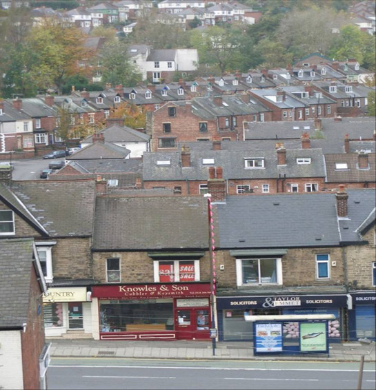 Text Box: Figure 1: A typical high density landscape of slate roofed brick properties in the